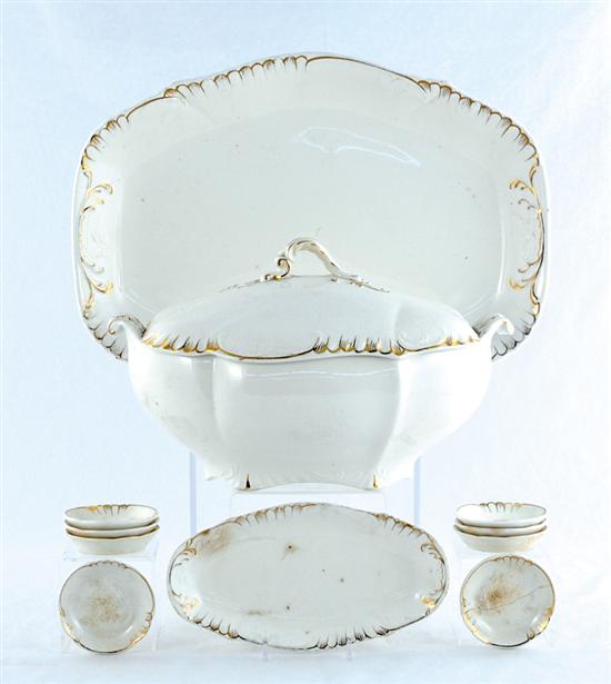 Appraisal: English ironstone tureen platter and dishes circa white body with