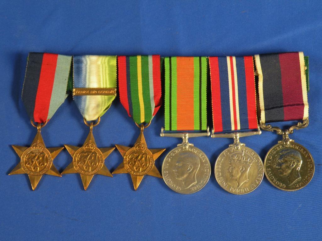 Appraisal: A group of medals awarded to Flight Sargent F G