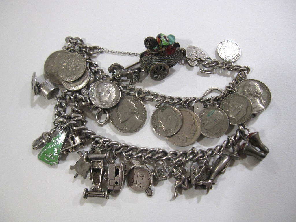 Appraisal: Lot comprising a silver charm bracelet silver coin bracelet and