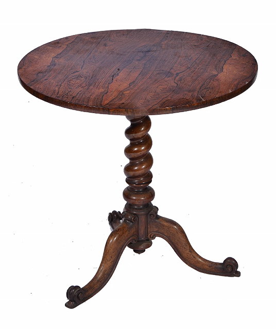 Appraisal: A VICTORIAN ROSEWOOD TRIPOD TABLE with tapering barley twist support