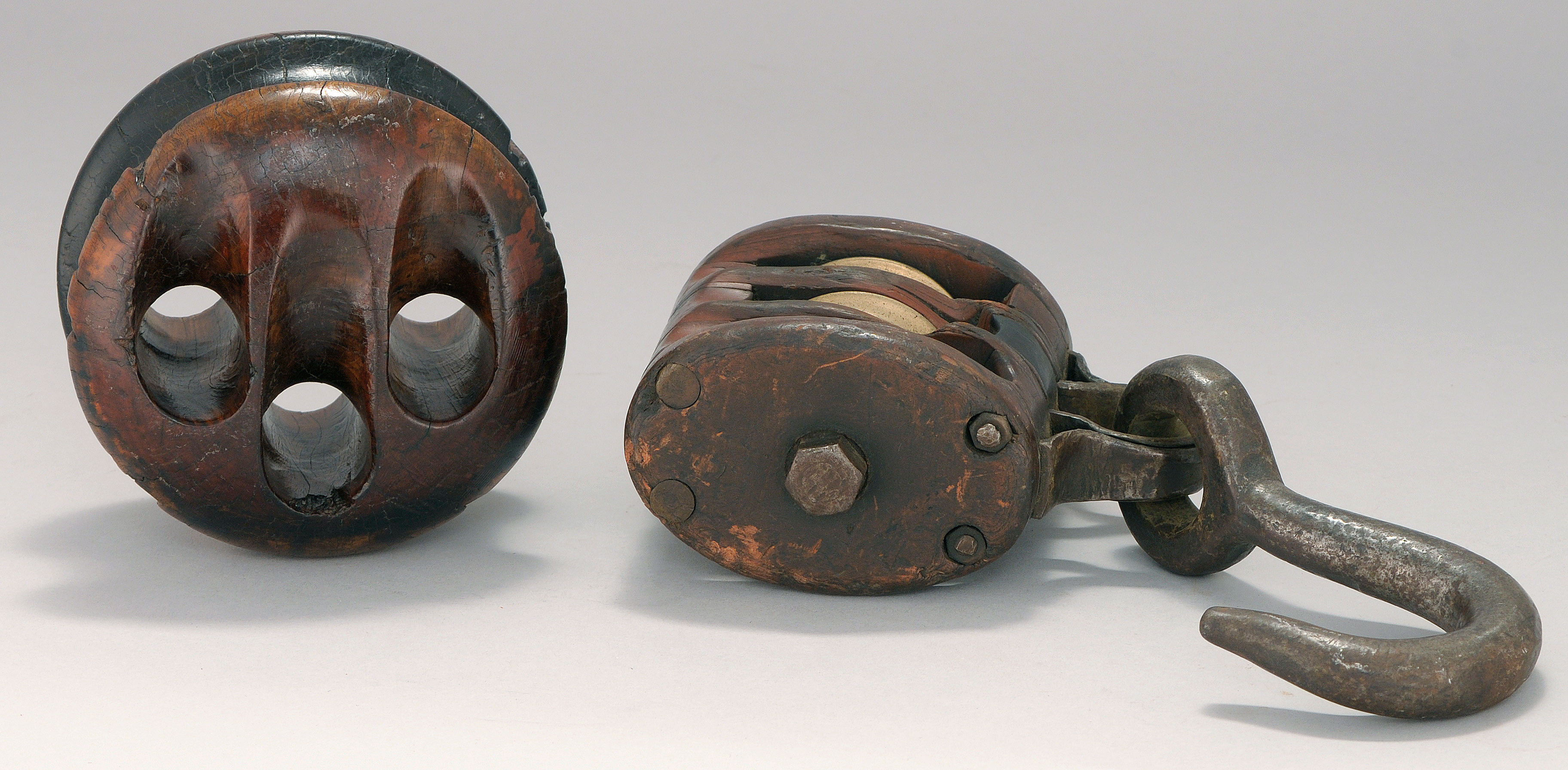 Appraisal: TWO MARINE ITEMS A deadeye diameter and a small block