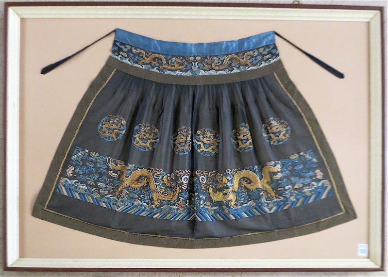 Appraisal: CHINESE EMBROIDERED APRON IN FRAME the main panel a black