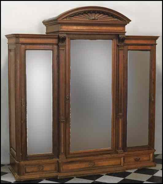 Appraisal: ENGLISH EARLY VICTORIAN MAHOGANY MIRRORED ARMOIRE Bearing an overhung cornice