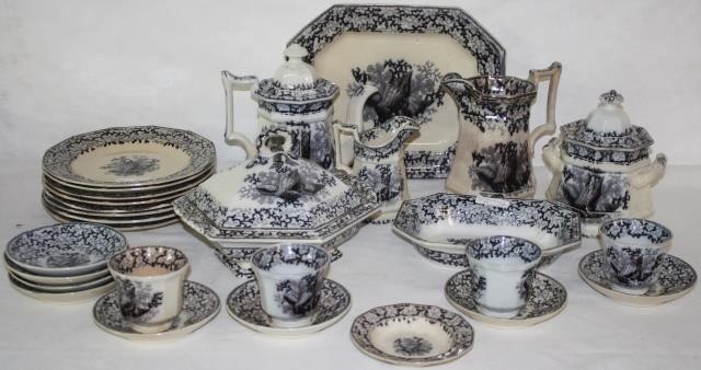 Appraisal: EARLY TH CENTURY FLOW MULBERRY -PIECE SEAWEEDPATTERN IRONSTONE TABLEWARE SET