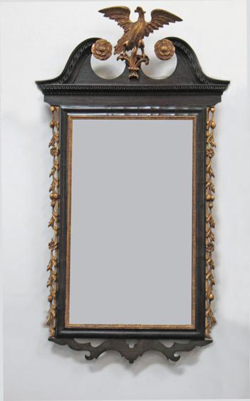 Appraisal: A GEORGE II STYLE MAHOGANY AND GILTWOOD WALL MIRROR the