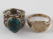 Appraisal: Two white metal tests silver rings one set with turquoise