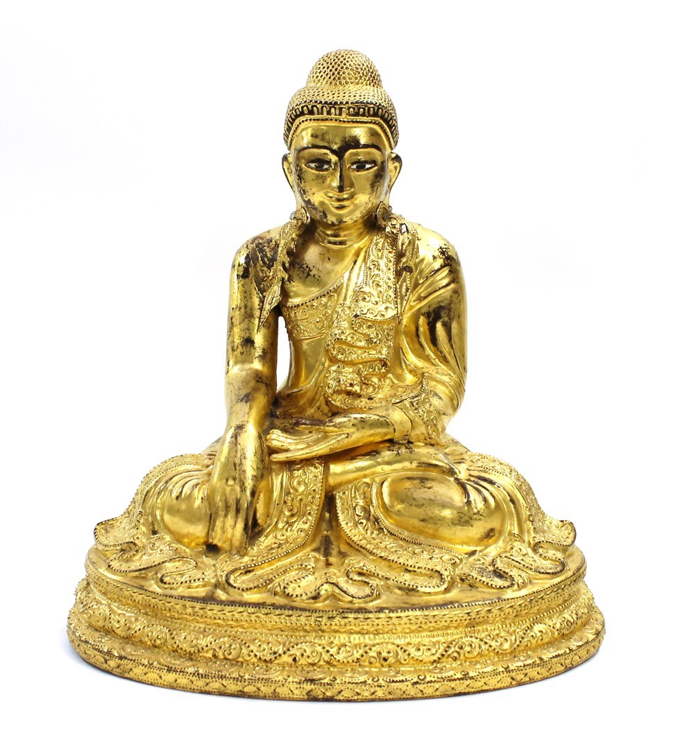 Appraisal: A th century giltwood figure of Buddha seated on an