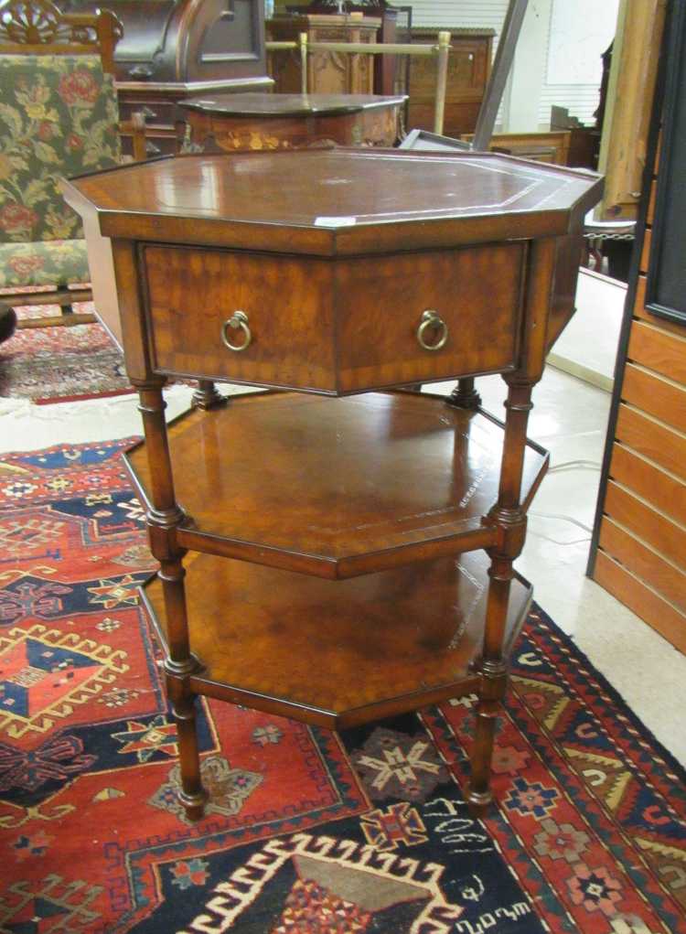 Appraisal: MAITLAND-SMITH OCCASIONAL TABLE octagonal three-tier design with drawer H x