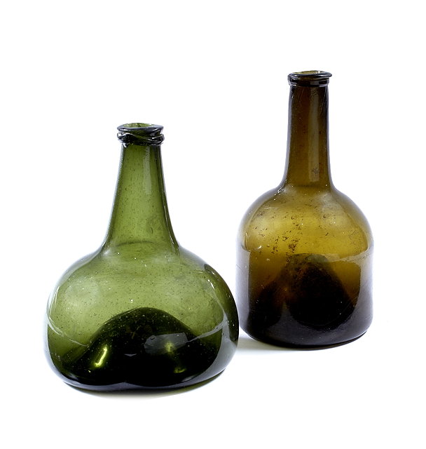 Appraisal: An English green glass wine bottle th Century cm and