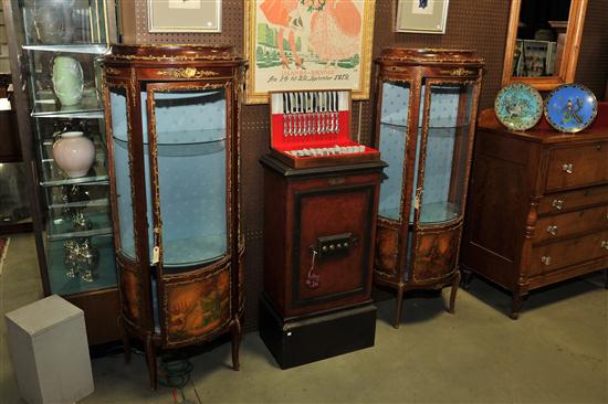 Appraisal: PAIR OF FRENCH STYLE CURIO CABINETS Mahogany veneered cabinets having