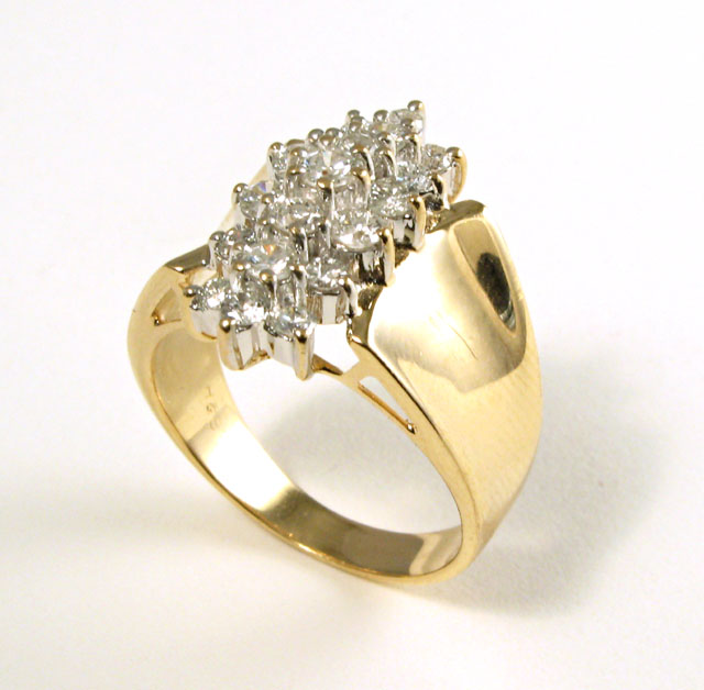 Appraisal: DIAMOND AND FOURTEEN KARAT GOLD RING set with a cluster