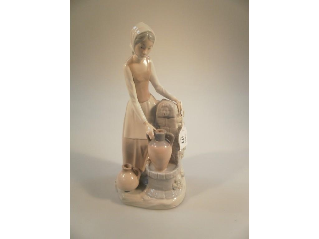 Appraisal: A Nao by Lladro large figurine of a lady filling