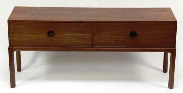 Appraisal: A teak chest of four drawers on square chamfered legs