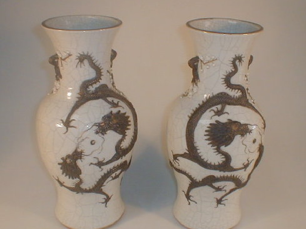 Appraisal: A pair of Chinese pottery vases of baluster form each