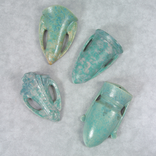 Appraisal: Four ROSEVILLE Carnelian II wall pockets all in blue-green mottled