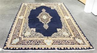 Appraisal: A Kirman Style Wool Rug feet inches x feet inches