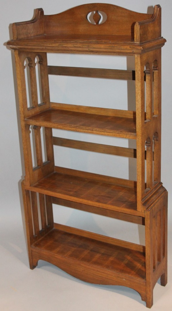 Appraisal: A late thC oak Edwardian bookcase in the manner of