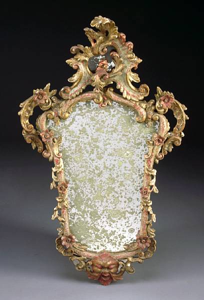 Appraisal: An Italian Rococo style painted and parcel gilt mirror first