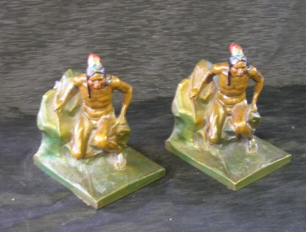 Appraisal: Pair of American Arts and Crafts Bronze-Patinated and Polychromed Spelter