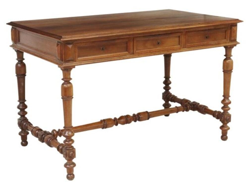 Appraisal: French walnut writing table desk th c three frieze drawers