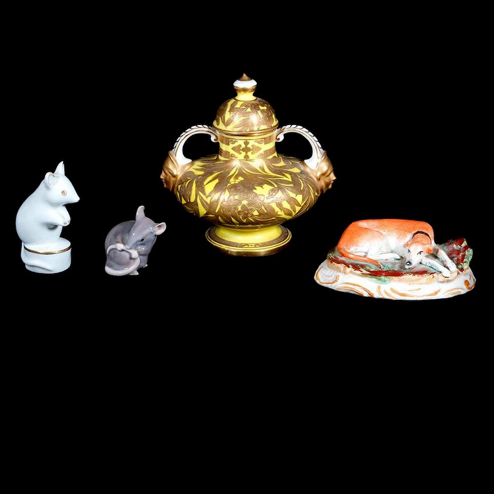 Appraisal: Three porcelain figures and a porcelain perfume jar An English