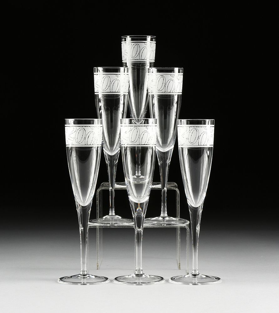 Appraisal: A SET OF SIX TIFFANY CO CRYSTAL MILLENNIUM CHAMPAGNE FLUTES