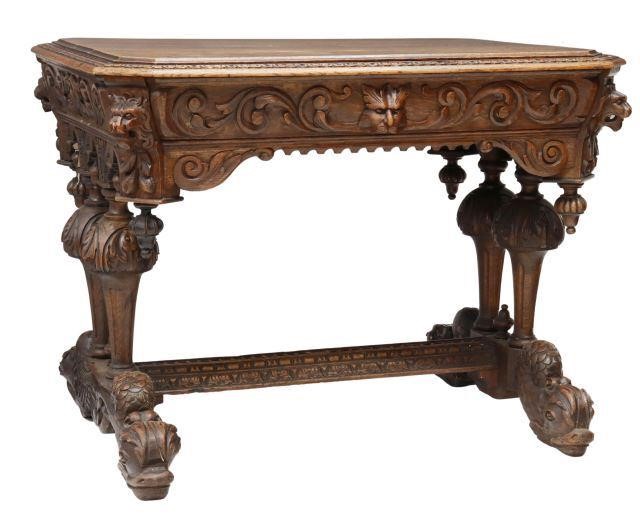 Appraisal: English ornately carved oak writing table th c rectangular top