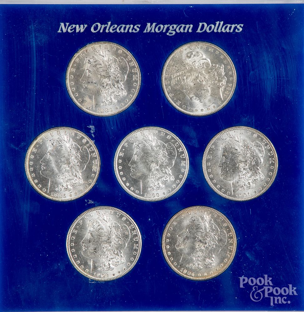 Appraisal: Seven New Orleans Morgan silver dollars Seven New Orleans Morgan