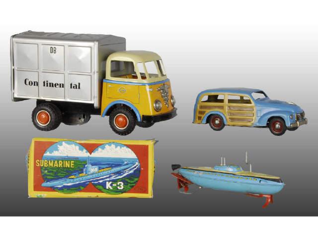 Appraisal: Lot of Tin Vehicle Toys Description German Gamma tin friction