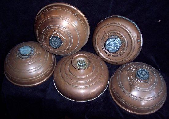 Appraisal: Three Wafax copper warming bottles of ribbed dome shape cm