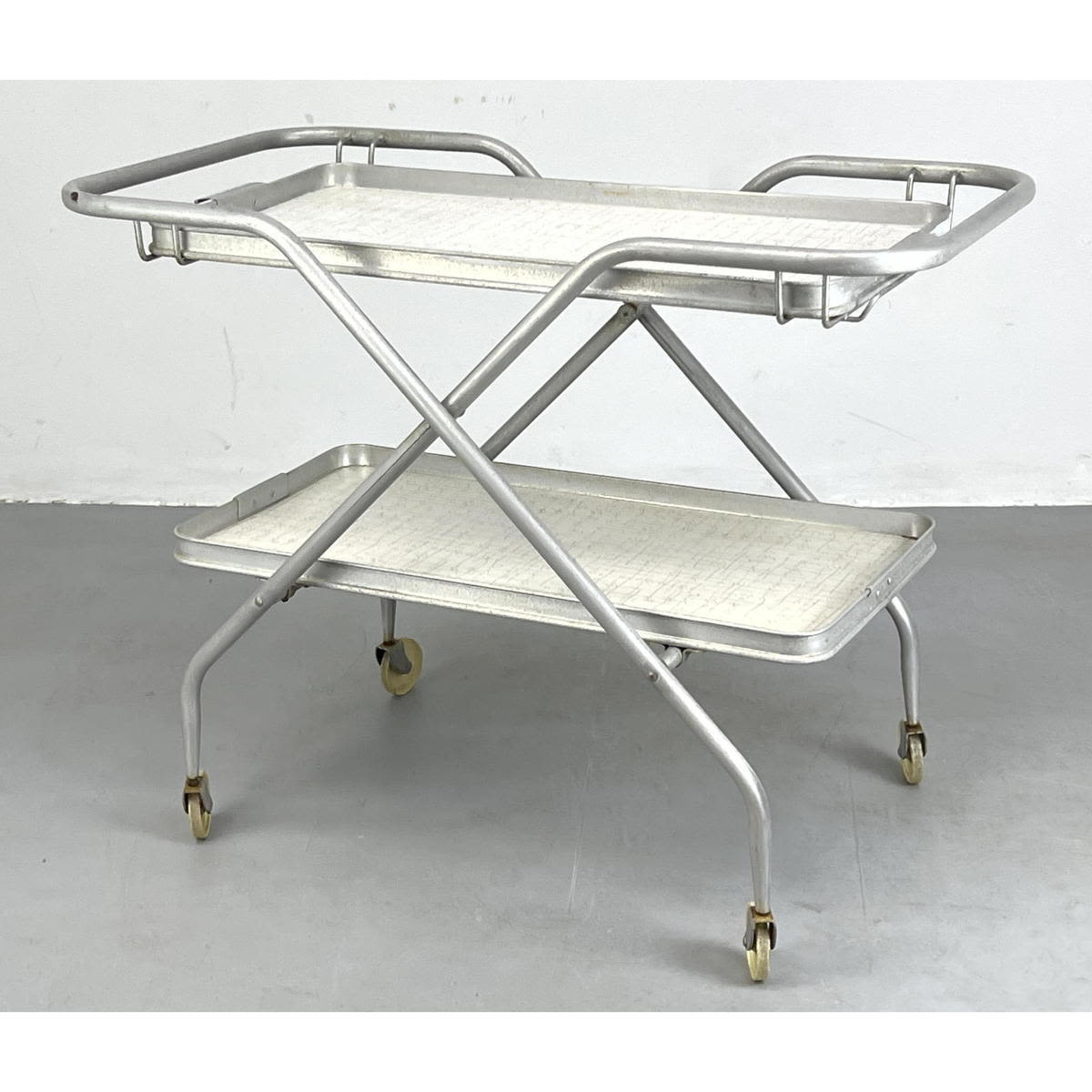 Appraisal: MCM Aluminum Rolling Serving Cart Two formica Levels Top Tray