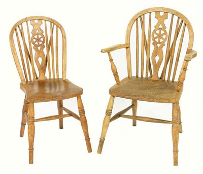 Appraisal: A harlequin set of six elm seated Windsor chairs comprising