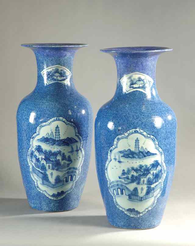 Appraisal: PAIR DUTCH DELFT BLUE AND WHITE POTTERY VASES in the