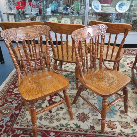 Appraisal: Oak Chairs carved backs spindle decor