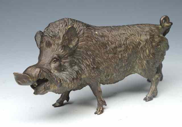 Appraisal: A BRONZE SMALL MODEL OF A BOAR probably circa across