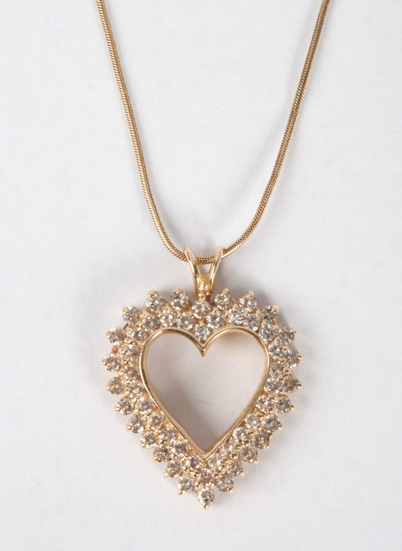 Appraisal: Lady's K gold diamond heart-shaped pendant and gold necklace the