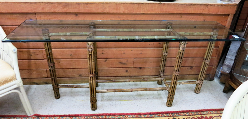 Appraisal: A MCGUIRE GLASS-TOP BAMBOO CONSOLE TABLE a John McGuire design