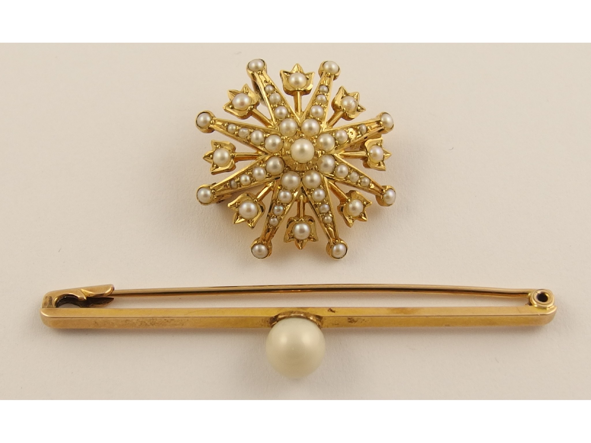 Appraisal: A ct Edwardian pearl set star pendant broochwith pearl set