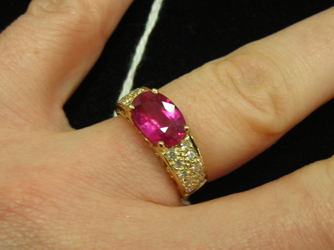 Appraisal: RUBY DIAMOND AND FOURTEEN KARAT GOLD RING Centered and prong