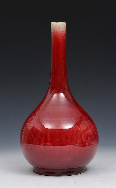 Appraisal: A CHINESE SANG DE BOUEF BOTTLE VASE th Century cm