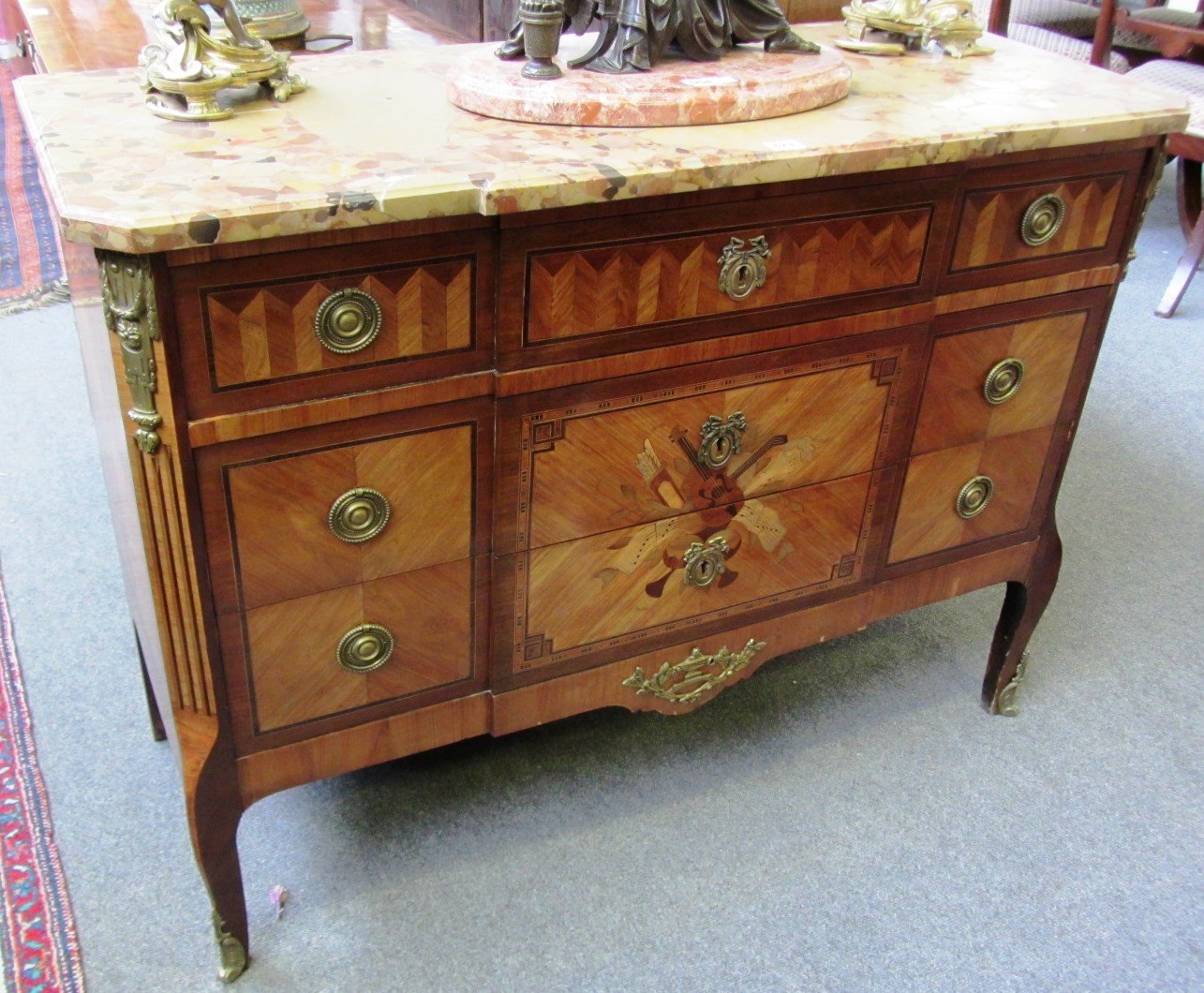 Appraisal: A Louis XVI style commode the scagliola top over a