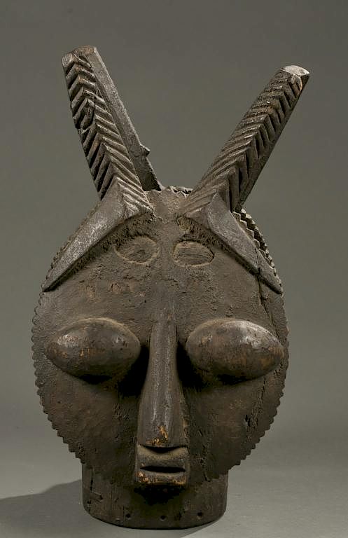 Appraisal: Ijebu janus horned dance crest th c A janus horned