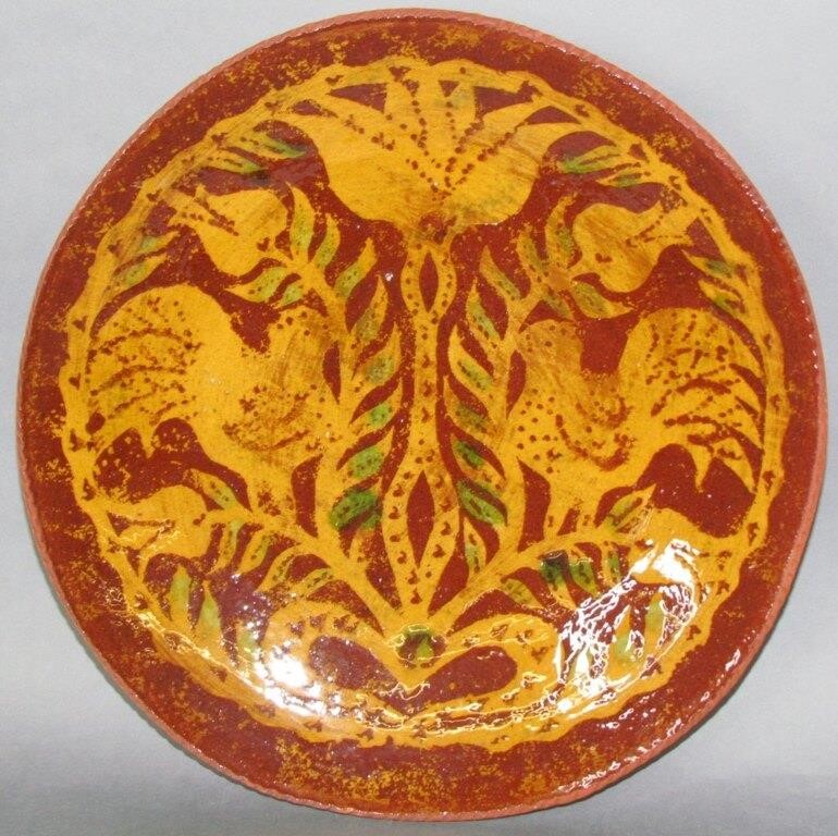 Appraisal: NED FOLTZ REDWARE PLATErooster and tulip motifs no damage