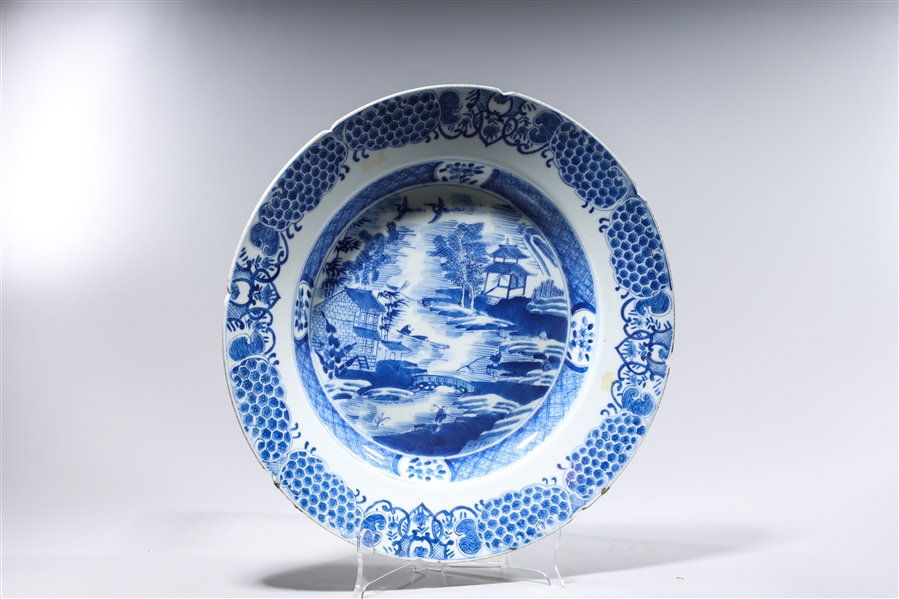 Appraisal: Chinese blue and white porcelain charger depicting figures in a