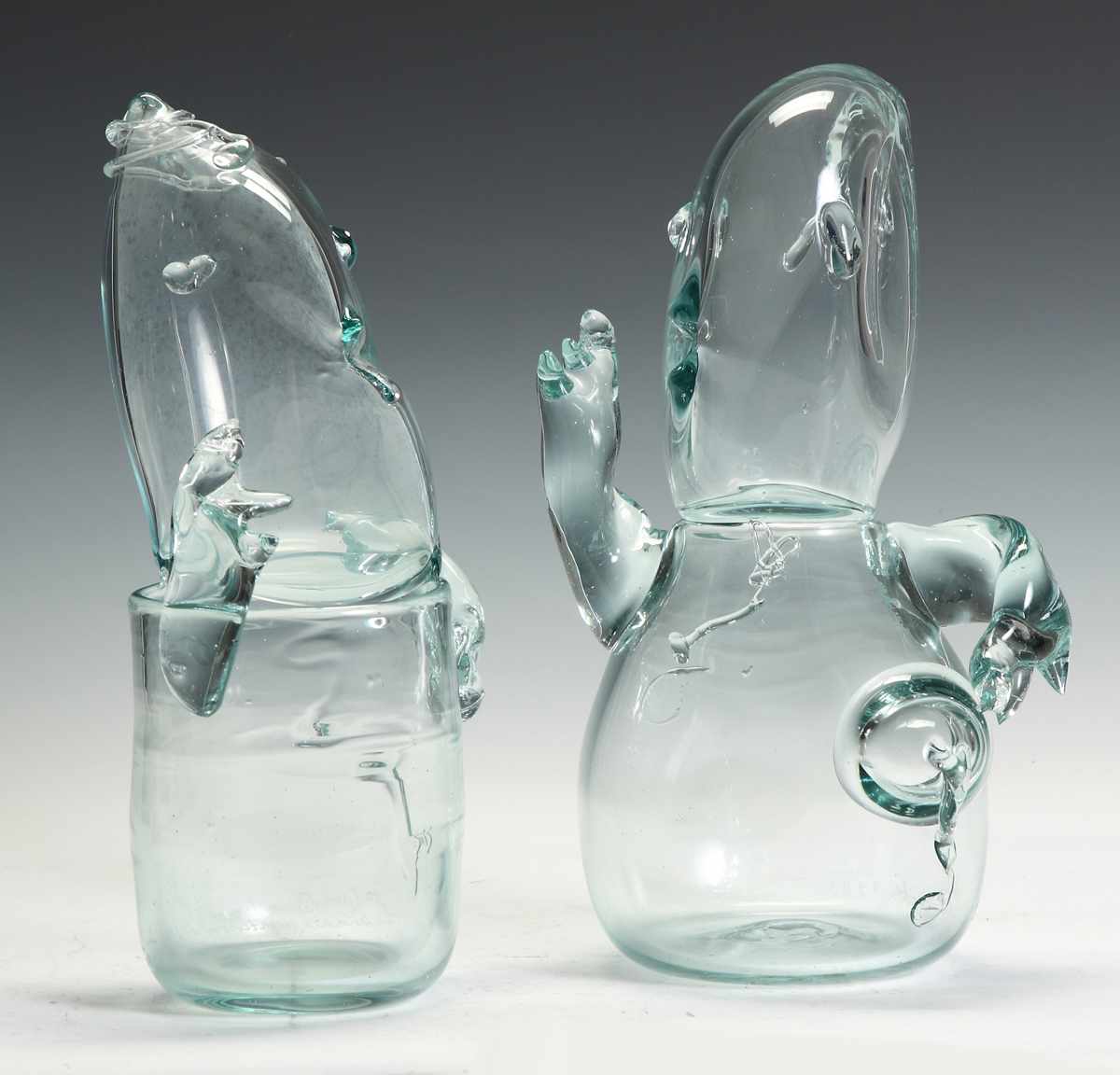 Appraisal: Erwin Eisch German B Two Clear Figural Vases Artist Work