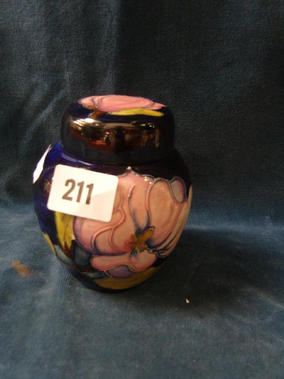 Appraisal: A blue ground Moorcroft ginger jar and cover in the