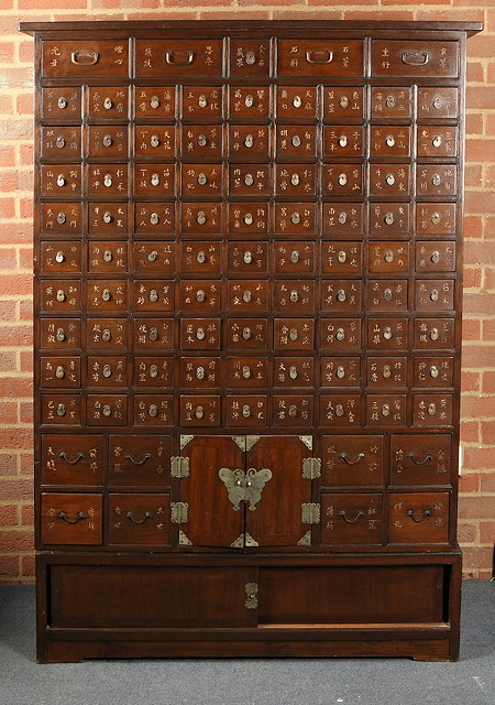 Appraisal: A KOREAN HERBAL MEDICINE CABINET with a multiple arrangement of