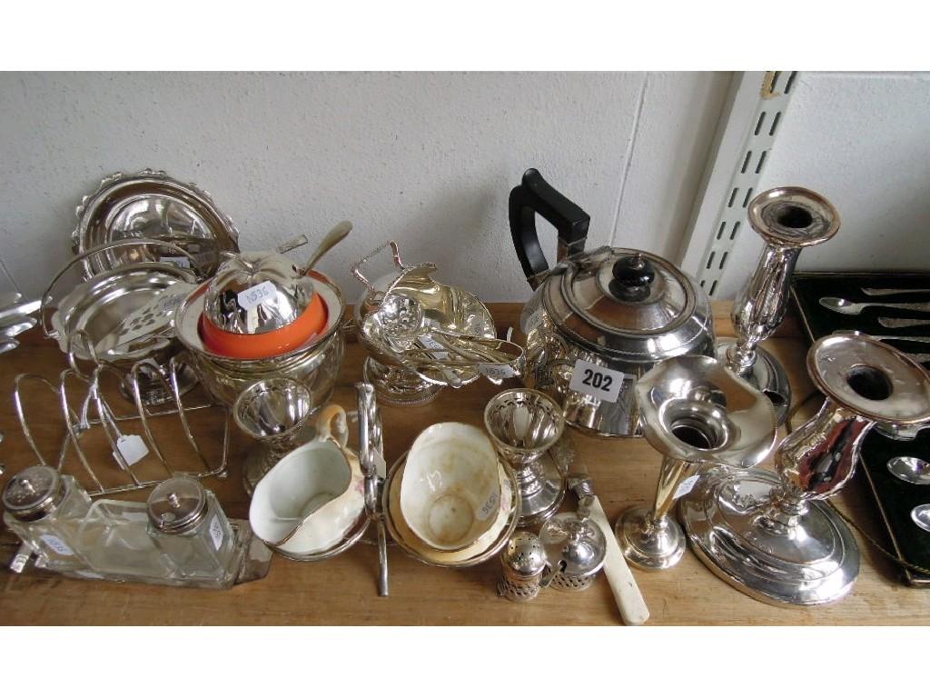 Appraisal: A collection of plated wares including a pair of candlesticks