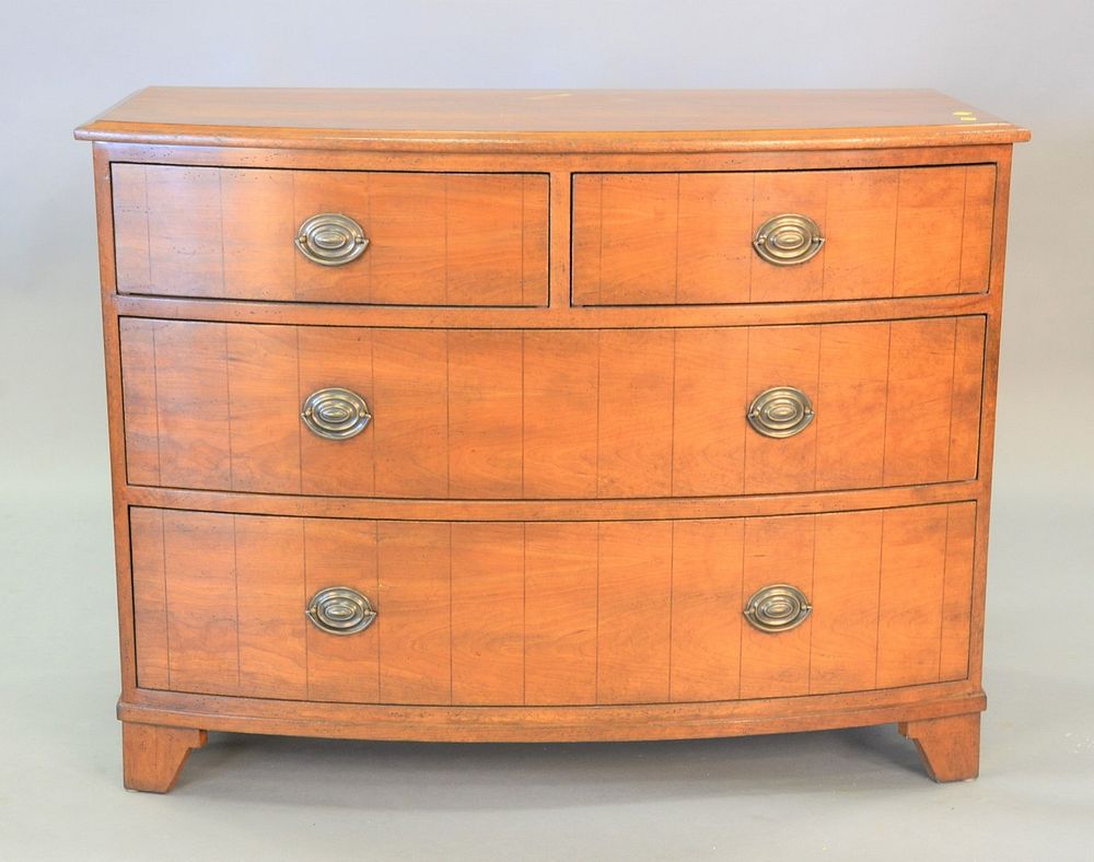 Appraisal: Georgian-style walnut bow front chest having short and long drawers