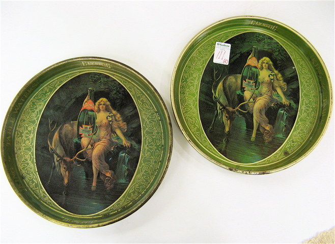 Appraisal: PAIR OF ROUND ADVERTISING TIN TIP TRAYS each of Clysmic